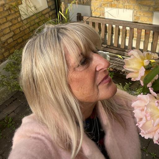 Rosie is a natural-born medium, Reiki Master, and clairvoyant offering guidance using Tarot, crystal ball, dowsing, and remote viewing for clarity and